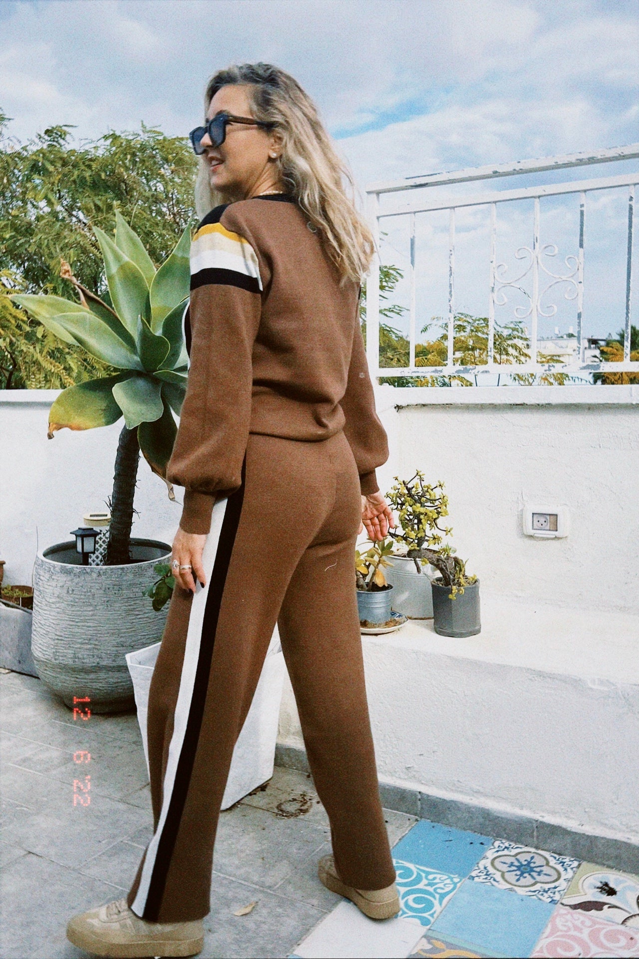 back view of KNITTED SUIT 70S Top style - two piece knitted set -סט שני חלקים לנשים